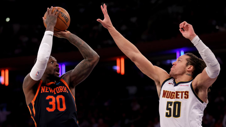 Jan 25, 2024; New York, New York, USA; New York Knicks forward Julius Randle (30) takes a shot against Denver Nuggets forward Aaron Gordon (50) during the third quarter at Madison Square Garden. Mandatory Credit: Brad Penner-USA TODAY Sports