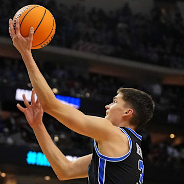 Mar 27, 2025; Newark, NJ, USA; Brigham Young Cougars guard Egor Demin (3) shoots the ball during the second half against the Alabama Crimson Tide during an East Regional semifinal of the 2025 NCAA tournament at Prudential Center. Mandatory Credit: Robert Deutsch-Imagn Images