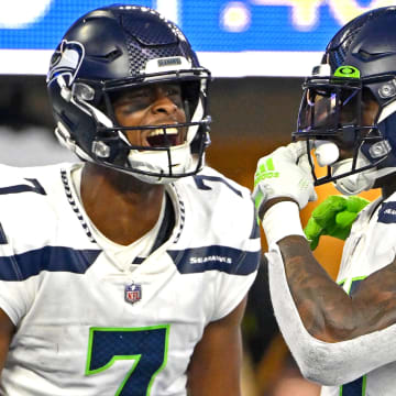 Dec 4, 2022; Inglewood, California, USA;  Seattle Seahawks quarterback Geno Smith (7) celebrates with wide receiver DK Metcalf (14) after a touchdown in the fourth quarter against the Los Angeles Rams at SoFi Stadium. Mandatory Credit: Jayne Kamin-Oncea-USA TODAY Sports