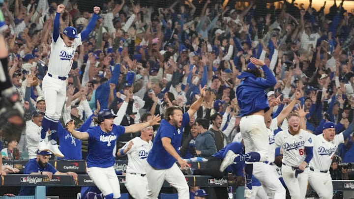 The Los Angeles Dodgers celebrate defeating the Toronto Blue Jays in the 18th inning of World Series Game 3. The Los Angeles Dodgers celebrate defeating the Toronto Blue Jays in the 18th inning of World Series Game 3.