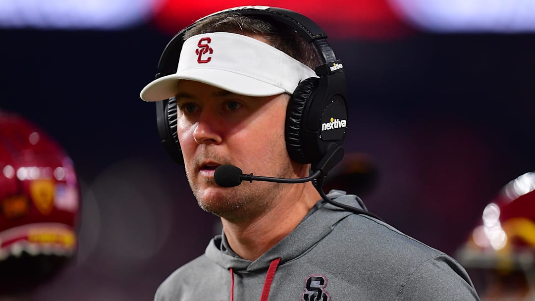 Dec 2, 2022; Las Vegas, NV, USA; Southern California Trojans head coach Lincoln Riley watches game action against the Utah Utes during the second half in the PAC-12 Football Championship at Allegiant Stadium. Mandatory Credit: Gary A. Vasquez-Imagn Images