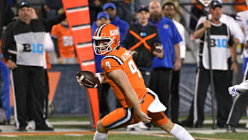 Sep 7, 2024; Champaign, Illinois, USA; Illinois Fighting Illini quarterback Luke Altmyer (9) runs with the ball during the second half against the Kansas Jayhawks at Memorial Stadium. Mandatory Credit: Ron Johnson-Imagn Images