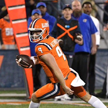 Sep 7, 2024; Champaign, Illinois, USA; Illinois Fighting Illini quarterback Luke Altmyer (9) runs with the ball during the second half against the Kansas Jayhawks at Memorial Stadium. Mandatory Credit: Ron Johnson-Imagn Images