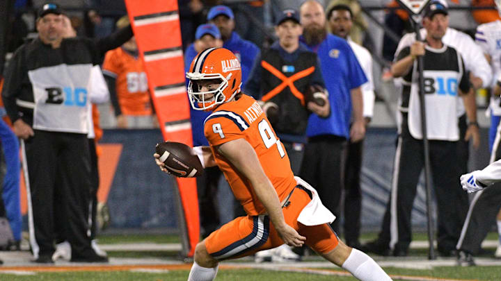 Sep 7, 2024; Champaign, Illinois, USA; Illinois Fighting Illini quarterback Luke Altmyer (9) runs with the ball during the second half against the Kansas Jayhawks at Memorial Stadium. Mandatory Credit: Ron Johnson-Imagn Images