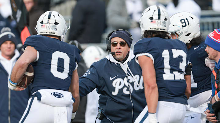 Penn State Nittany Lions head coach James Franklin celebrates with linebacker Dominic DeLuca (0) after an interception return for a touchdown during the first half against the SMU Mustangs at Beaver Stadium. Penn State Nittany Lions head coach James Franklin celebrates with linebacker Dominic DeLuca (0) after an interception return for a touchdown during the first half against the SMU Mustangs at Beaver Stadium.