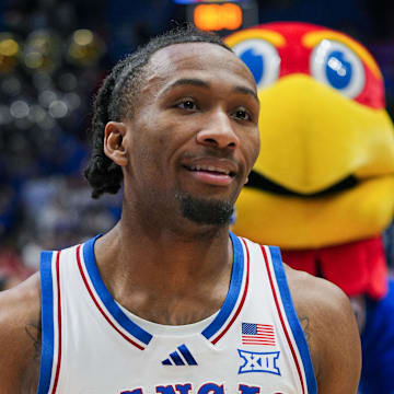 Nov 3, 2025; Lawrence, Kansas, USA; Kansas Jayhawks guard Darryn Peterson (22) reacts after defeating the Green Bay Phoenix at Allen Fieldhouse. Mandatory Credit: Jay Biggerstaff-Imagn Images