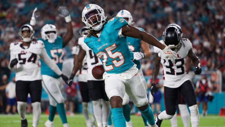 Aug 9, 2024; Miami Gardens, Florida, USA; Miami Dolphins running back Jaylen Wright (25) celebrates after scoring a touchdown against the Atlanta Falcons in the second quarter during preseason at Hard Rock Stadium. Mandatory Credit: Nathan Ray Seebeck-USA TODAY Sports