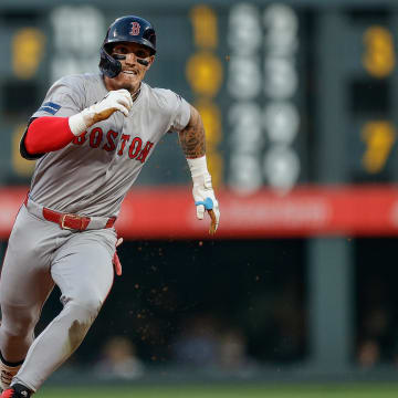 Boston Red Sox center fielder Jarren Duran (16) runs to third on a triple in the fifth inning against the Colorado Rockies at Coors Field on July 22.