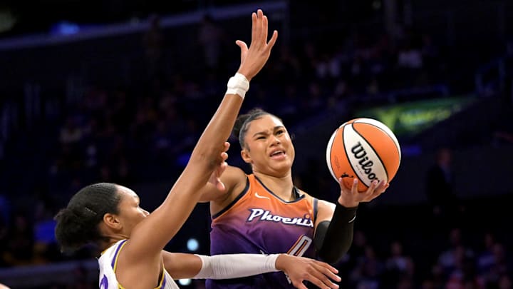 Aug 26, 2025; Los Angeles, California, USA; Phoenix Mercury forward Satou Sabally (0) is defended by Los Angeles Sparks forward Azura Stevens (23) as she drives to the basket during the first half at Crypto.com Arena. Mandatory Credit: Jayne Kamin-Oncea-Imagn Images Aug 26, 2025; Los Angeles, California, USA; Phoenix Mercury forward Satou Sabally (0) is defended by Los Angeles Sparks forward Azura Stevens (23) as she drives to the basket during the first half at Crypto.com Arena. Mandatory Credit: Jayne Kamin-Oncea-Imagn Images