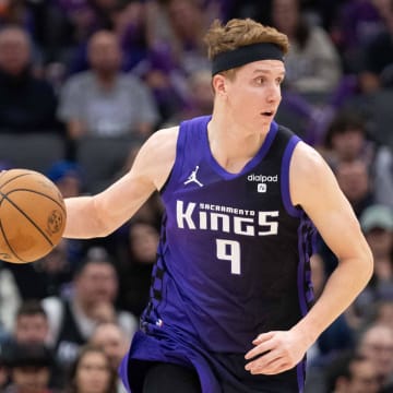 December 16, 2023; Sacramento, California, USA; Sacramento Kings guard Kevin Huerter (9) dribbles the basketball during the third quarter against the Utah Jazz at Golden 1 Center. 