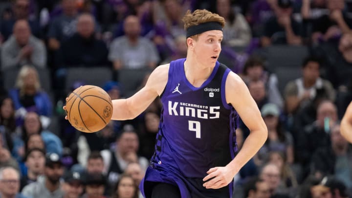 December 16, 2023; Sacramento, California, USA; Sacramento Kings guard Kevin Huerter (9) dribbles the basketball during the third quarter against the Utah Jazz at Golden 1 Center. 