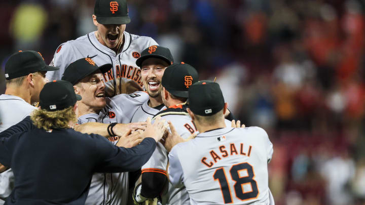 Aug 2, 2024; Cincinnati, Ohio, USA; San Francisco Giants starting pitcher Blake Snell (7) celebrates with teammates after throwing a no-hitter against the Cincinnati Reds at Great American Ball Park.