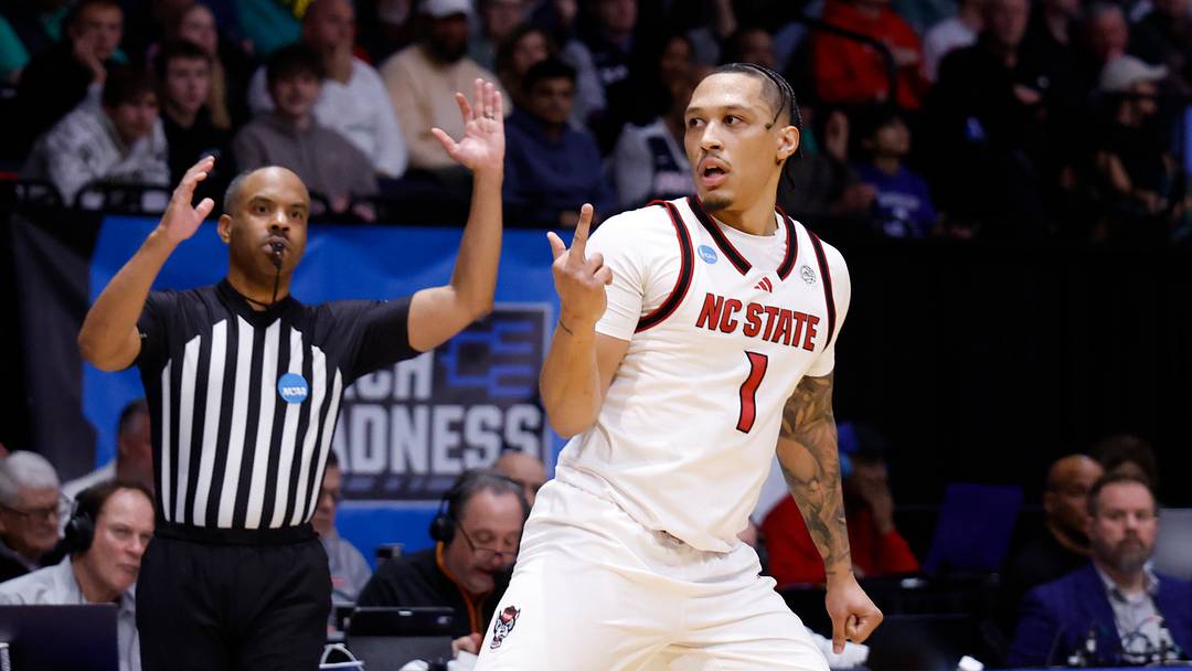 Mar 17, 2026; Dayton, OH, USA; (Editors note: obscene gesture) NC State Wolfpack forward Darrion Williams (1) reacts in the first half against the Texas Longhorns during a first four game of the men's 2026 NCAA Tournament at University of Dayton Arena. Mandatory Credit: Rick Osentoski-Imagn Images Mar 17, 2026; Dayton, OH, USA; (Editors note: obscene gesture) NC State Wolfpack forward Darrion Williams (1) reacts in the first half against the Texas Longhorns during a first four game of the men's 2026 NCAA Tournament at University of Dayton Arena. Mandatory Credit: Rick Osentoski-Imagn Images