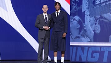 Jun 25, 2025; Brooklyn, NY, USA;  Tre Johnson stands with NBA commissioner Adam Silver after being selected as the sixth pick by the Washington Wizards in the first round of the 2025 NBA Draft at Barclays Center. Mandatory Credit: Brad Penner-Imagn Images