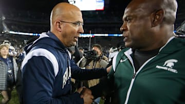 Nov 26, 2022; University Park, Pennsylvania, USA; Penn State Nittany Lions head coach James Franklin (left) and Michigan State Spartans head coach Mel Tucker (right) shake hands following the  competition of the game at Beaver Stadium. Penn State defeated Michigan State 35-16. Mandatory Credit: Matthew OHaren-Imagn Images
