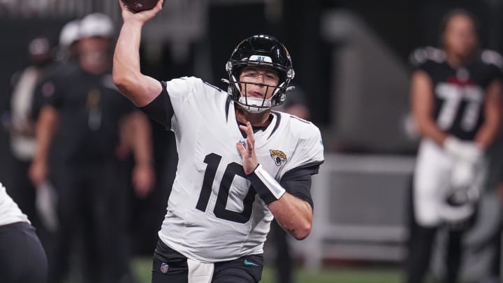 Aug 23, 2024; Atlanta, Georgia, USA; Jacksonville Jaguars quarterback Mac Jones (10) passes against the Atlanta Falcons during the first half at Mercedes-Benz Stadium.