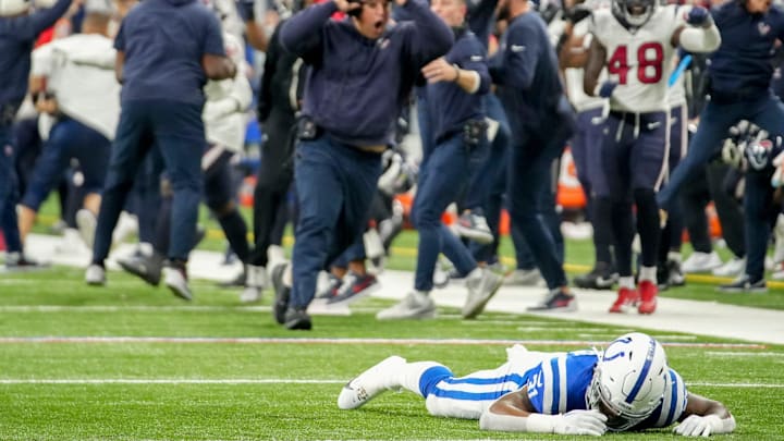 Indianapolis Colts running back Tyler Goodson (31) lies on the turf after missing a catch on fourth down Saturday, Jan. 6, 2024, during a game against the Houston Texans at Lucas Oil Stadium in Indianapolis.