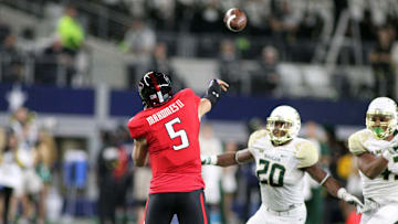 Nov 25, 2016; Arlington, TX, USA;  Texas Tech Red Raiders quarterback Patrick Mahomes (5) passes over Baylor Bears defensive back Aiavion Edwards (20) in the first half at AT&T Stadium. Mandatory Credit: Michael C. Johnson-Imagn Images