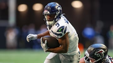 Oct 20, 2024; Atlanta, Georgia, USA; Seattle Seahawks running back Kenneth Walker III (9) runs the ball against the Atlanta Falcons in the first quarter at Mercedes-Benz Stadium.