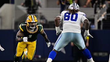Sep 28, 2025; Arlington, Texas, USA; Green Bay Packers defensive end Micah Parsons (1) rushes past the block of Dallas Cowboys offensive tackle Tyler Guyton (60) during the game between the Dallas Cowboys and the Green Bay Packers at AT&T Stadium. Mandatory Credit: Jerome Miron-Imagn Images