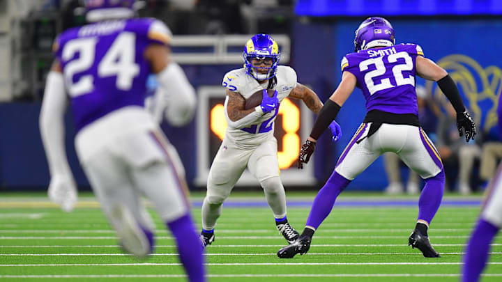 Oct 24, 2024; Inglewood, California, USA; Los Angeles Rams running back Blake Corum (22) runs the ball against the Minnesota Vikings during the second half at SoFi Stadium. Mandatory Credit: Gary A. Vasquez-Imagn Images