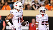 Oct 18, 2025; Stillwater, Oklahoma, USA; Cincinnati Bearcats tight end Joe Royer (11) runs into the end zone for a touchdown during the first half against the Oklahoma State Cowboys at Boone Pickens Stadium. Mandatory Credit: William Purnell-Imagn Images