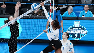 Kentucky's Jordyn Dailey (5) spiked against Cleveland State during the NCAA Women's Volleyball Tournament at Memorial Coliseum in Lexington, Ky. on Dec. 5, 2024.