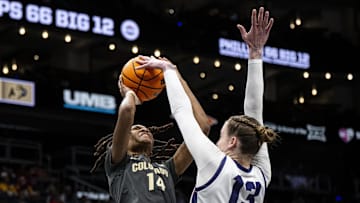 Mar 7, 2025; Kansas City, MO, USA; TCU Horned Frogs center Sedona Prince (13) blocks a shot by Colorado Buffaloes forward Jade Masogayo (14) during the third quarter at T-Mobile Center. Mandatory Credit: Amy Kontras-Imagn Images