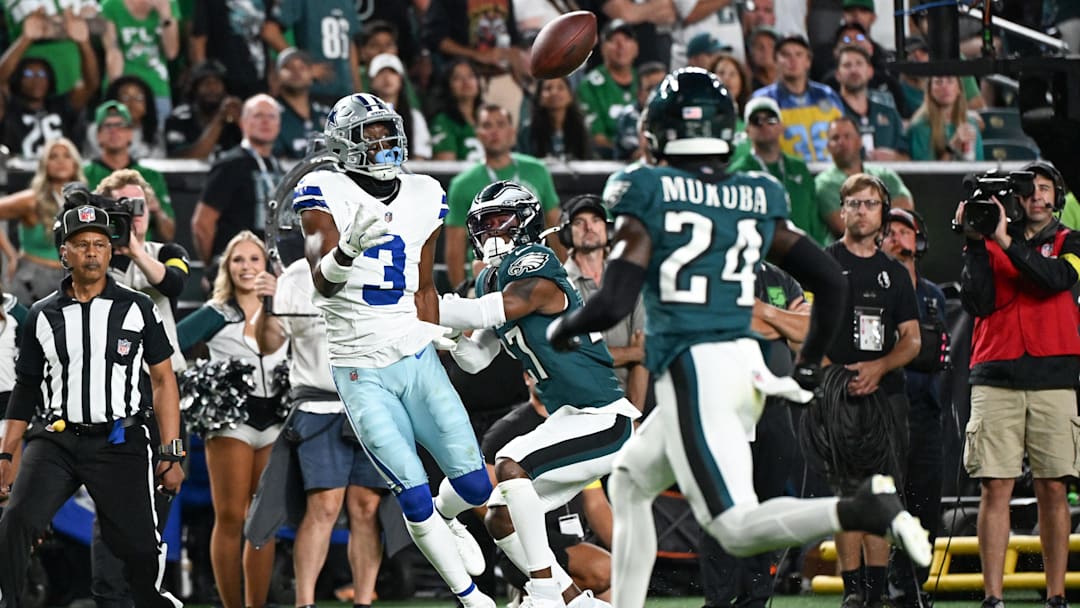 Sep 4, 2025; Philadelphia, Pennsylvania, USA; Dallas Cowboys wide receiver George Pickens (3) makes a reception defended by Philadelphia Eagles cornerback Quinyon Mitchell (27) during the first quarter of the game at Lincoln Financial Field. Mandatory Credit: Eric Hartline-Imagn Images