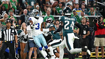 Sep 4, 2025; Philadelphia, Pennsylvania, USA; Dallas Cowboys wide receiver George Pickens (3) makes a reception defended by Philadelphia Eagles cornerback Quinyon Mitchell (27) during the first quarter of the game at Lincoln Financial Field. Mandatory Credit: Eric Hartline-Imagn Images