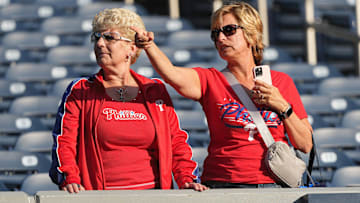 Philadelphia Phillies fans show their support during batting practice before a game against the Toronto Blue Jays at Rogers Centre.
