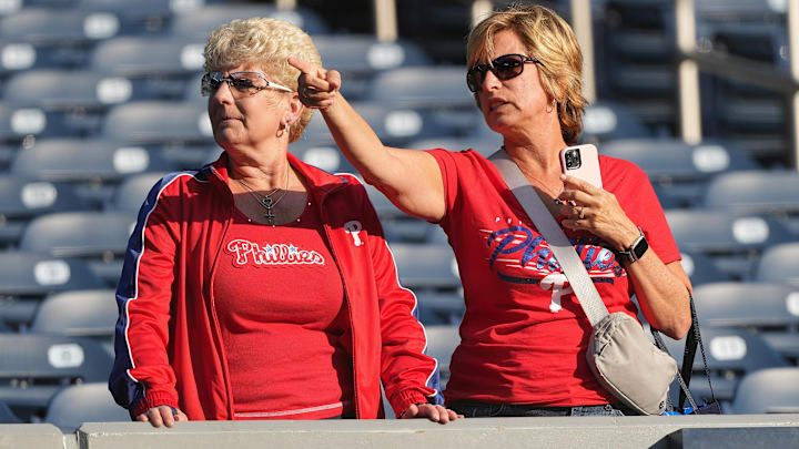 Philadelphia Phillies fans show their support during batting practice before a game against the Toronto Blue Jays at Rogers Centre.