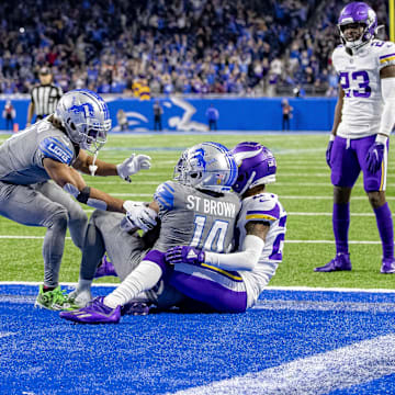 Detroit Lions wide receiver Amon-Ra St. Brown (14) catches the game winning touchdown against Vikings 