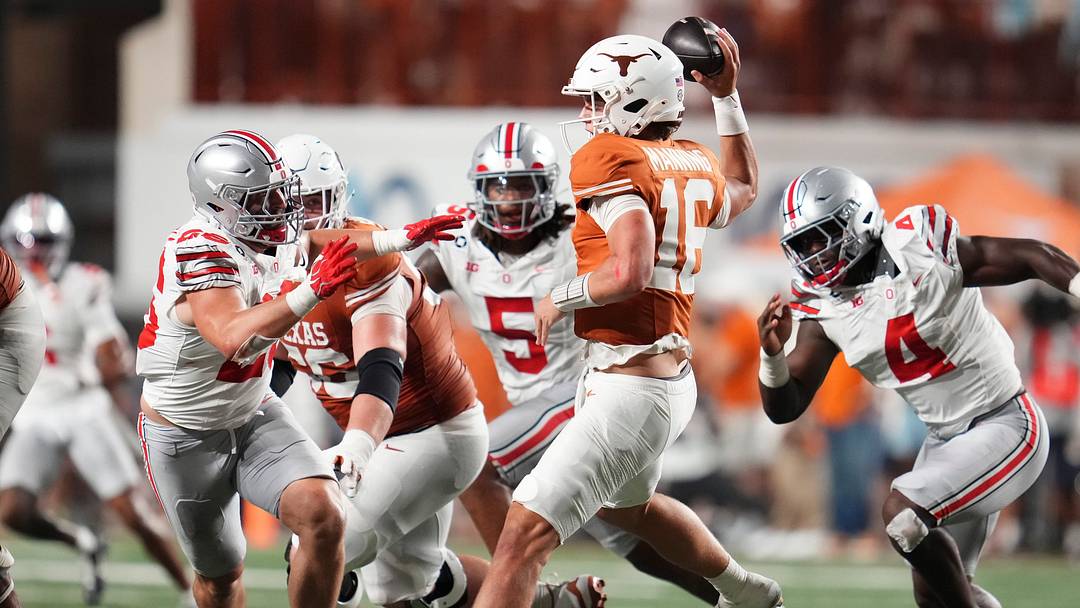 Texas Longhorns quarterback Arch Manning (16) looks to throw over Ohio State Buckeyes linebacker Payton Pierce (26) during the NCAA football game at Darrell K Royal–Texas Memorial Stadium in Austin, Texas on Sept. 12, 2026. Texas won 24-23.