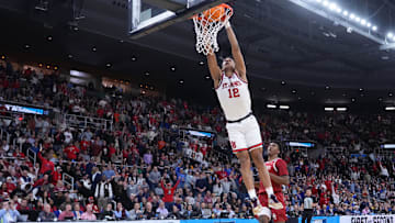  RJ Luis dunks against Arkansas in the NCAA Tournament. A 6-7 guard, he's the highest-ranked recruit available in the transfer portal according to On3 Sports.