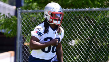 Jun 10, 2024; Foxborough, MA, USA; New England Patriots running back Rhamondre Stevenson (38) walks to the practice fields for minicamp at Gillette Stadium. Mandatory Credit: Eric Canha-USA TODAY Sports