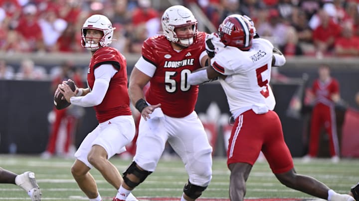 Sep 7, 2024; Louisville, Kentucky, USA;  Louisville Cardinals quarterback Tyler Shough (9) looks to pass against the Jacksonville State Gamecocks during the first half at L&N Federal Credit Union Stadium. Mandatory Credit: Jamie Rhodes-Imagn Images