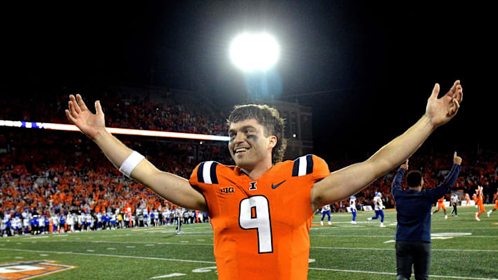 Sep 7, 2024; Champaign, Illinois, USA; Illinois Fighting Illini quarterback Luke Altmyer (9) celebrates a win over the Kansas Jayhawks at Memorial Stadium. Mandatory Credit: Ron Johnson-Imagn Images