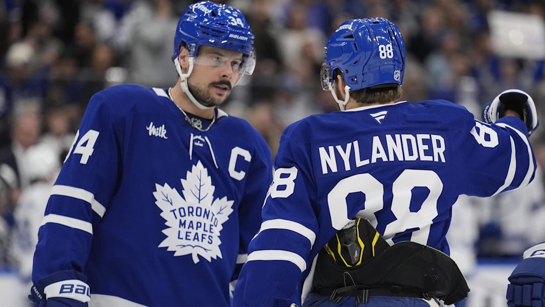 Dec 8, 2025; Toronto, Ontario, CAN; Toronto Maple Leafs forward William Nylander (88) and forward Auston Matthews (34) discuss a play against the Tampa Bay Lightning during the first period at Scotiabank Arena. Mandatory Credit: John E. Sokolowski-Imagn Images