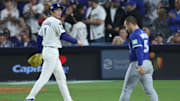 Oct 27, 2025; Los Angeles, California, USA; Los Angeles Dodgers pitcher Roki Sasaki (11) reacts after the ninth inning against the Toronto Blue Jays in game three of the 2025 MLB World Series at Dodger Stadium. Mandatory Credit: Kiyoshi Mio-Imagn Images