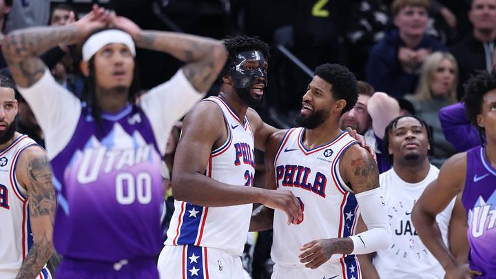 Dec 28, 2024; Salt Lake City, Utah, USA; Philadelphia 76ers center Joel Embiid (21) and forward Paul George (8) react to a play against the Utah Jazz during the fourth quarter at Delta Center. Mandatory Credit: Rob Gray-Imagn Images