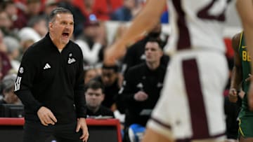 Mar 21, 2025; Raleigh, NC, USA; Mississippi State Bulldogs head coach Chris Jans reacts during the second half against the Baylor Bears in the first round of the NCAA Tournament at Lenovo Center. Mandatory Credit: Zachary Taft-Imagn Images
