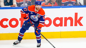 Jun 14, 2025; Edmonton, Alberta, CAN; Edmonton Oilers center Connor McDavid (97) controls the puck against the Florida Panthers during the second period in game five of the 2025 Stanley Cup Final at Rogers Place. Mandatory Credit: Sergei Belski-Imagn Images