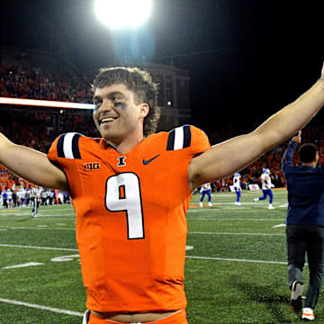 Sep 7, 2024; Champaign, Illinois, USA; Illinois Fighting Illini quarterback Luke Altmyer (9) celebrates a win over the Kansas Jayhawks at Memorial Stadium. Mandatory Credit: Ron Johnson-Imagn Images