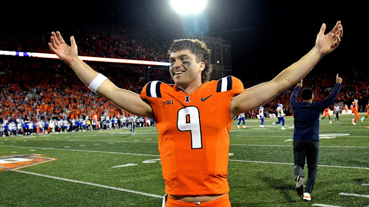 Illinois Fighting Illini quarterback Luke Altmyer (9) celebrates a win 