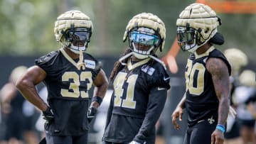 Jun 13, 2023; New Orleans, LA, USA;  New Orleans Saints running back Alvin Kamara (41) and New Orleans Saints running back Jamaal Williams (30) during minicamp at the Ochsner Sports Performance Center. Mandatory Credit: Stephen Lew-USA TODAY Sports