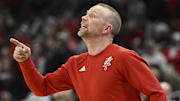 Feb 8, 2025; Louisville, Kentucky, USA;   Louisville Cardinals head coach Pat Kelsey talks to his players during the second half against the Miami (FL) Hurricanes at KFC Yum! Center. Louisville defeated Miami 88-78. 