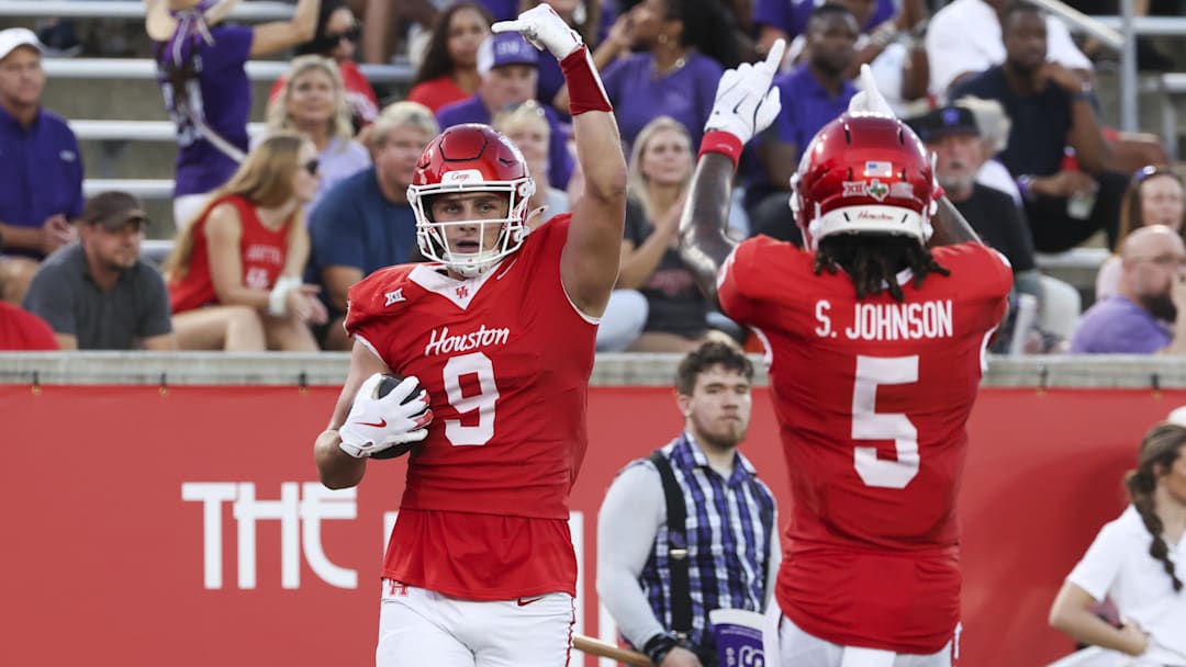 Houston Cougars tight end Tanner Koziol celebrates with wide receiver Stephon Johnson