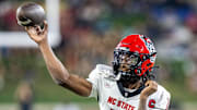 Sep 11, 2025; Winston-Salem, North Carolina, USA;  North Carolina State Wolfpack quarterback CJ Bailey (11) throws a pass in first half against the Wake Forest Demon Deacons at Allegacy Federal Credit Union Stadium. Mandatory Credit: Luke Jamroz-Imagn Images