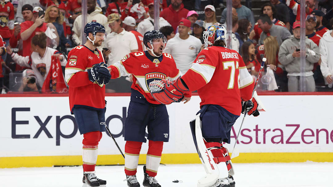 May 11, 2025; Sunrise, Florida, USA; Florida Panthers goaltender Sergei Bobrovsky (72), Florida Panthers center Brad Marchand (63) and Florida Panthers center Sam Reinhart (13) celebrate after they beat the Toronto Maple Leafs in game four of the second round of the 2025 Stanley Cup Playoffs at Amerant Bank Arena. Mandatory Credit: Kim Klement Neitzel-Imagn Images